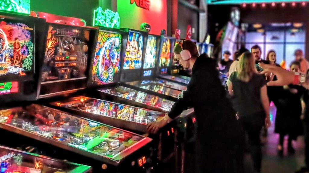 Pinball Tournament Player Focused on Winning Cash, Prizes and Trophy in the Final Round